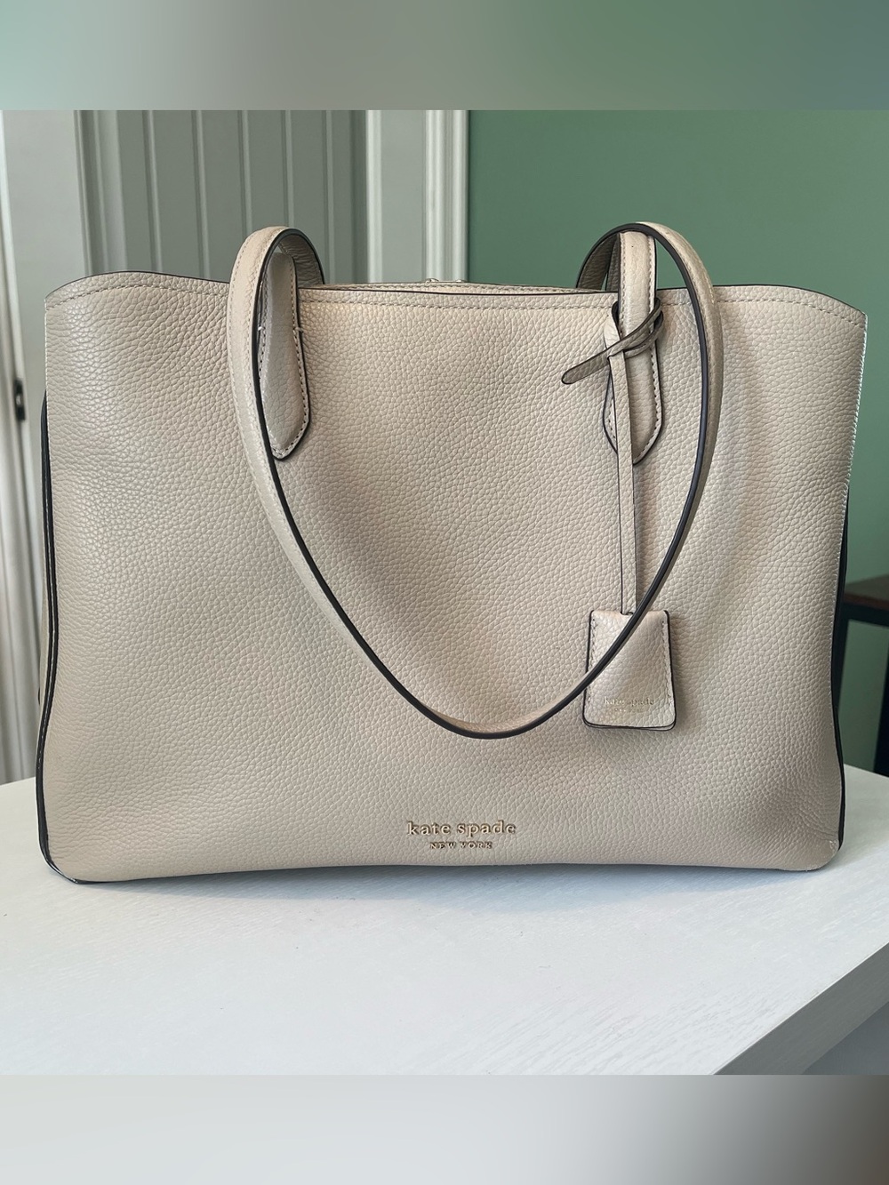kate spade Cream Pebbled Leather Tote with Black Edge Trim